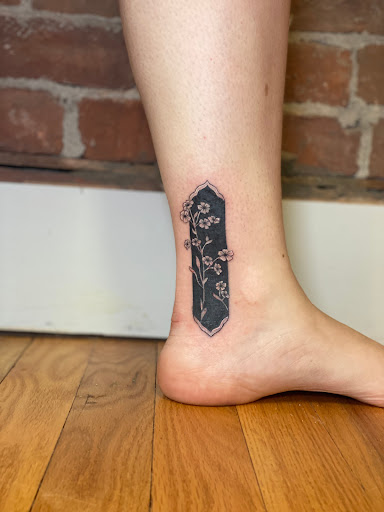 Explore leg tattoo placement ideas, creative tattoo ideas in Chatham, available at Gilded Lily Tattoo