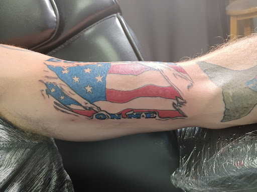 Explore hunting tattoo ideas for men, creative tattoo ideas in Owosso, available at Twisted ink tattoo