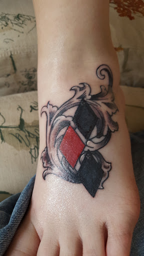 Explore soccer tattoo ideas, creative tattoo ideas in Warrensburg, available at Black Compass Tattoo Company