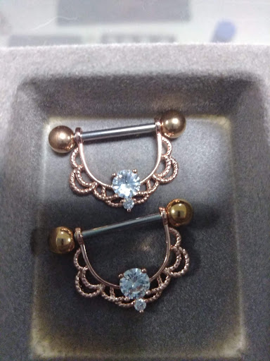 Explore fine line tattoo ideas with meaning, creative tattoo ideas in Laurel, available at Ambitious Creations Tattoo and Piercing Studio