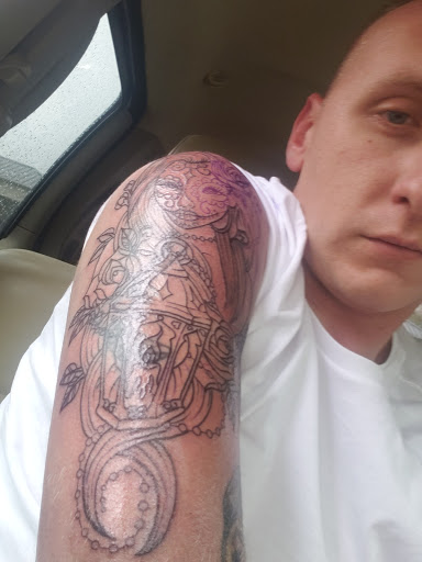 Explore female tattoo ideas for arm, creative tattoo ideas in Palestine, available at 2 Crows Tattoo