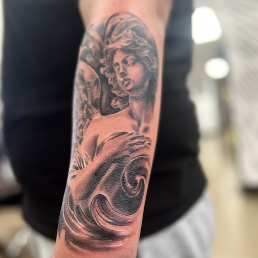 Find breast tattoo ideas for females for your next unique tattoo in Maryland Heights at Thirteen Roses Tattoo & Aesthetics