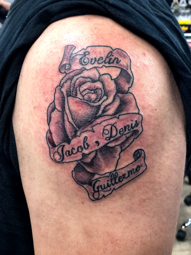 Explore tattoo ideas for behind the ear, creative tattoo ideas in Huntsville, available at Blessed Ink