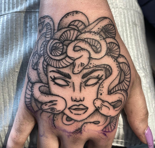 Explore black tattoo ideas for men, creative tattoo ideas in Pittsburgh, available at Pittsburgh Tattoo Company