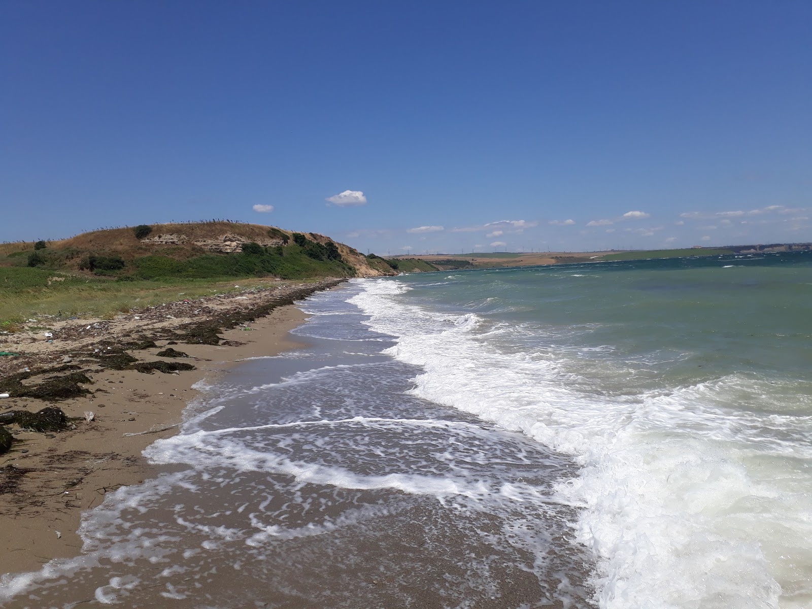 Photo de Kalanora Kumsali avec l'eau turquoise de surface