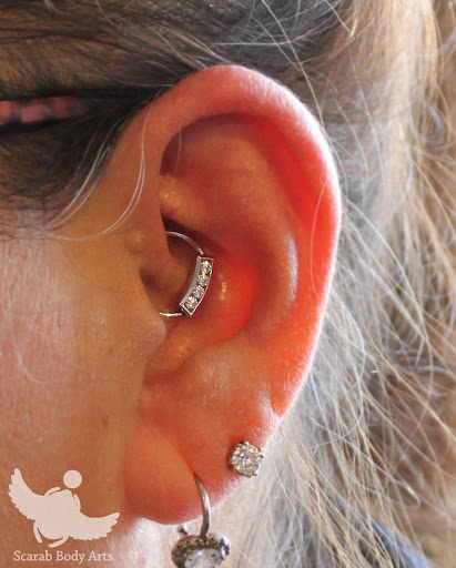 Explore archangel gabriel tattoo ideas, creative tattoo ideas in Syracuse, available at Scarab Body Arts