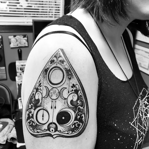 Explore disney sleeve tattoo ideas, creative tattoo ideas in Hamden, available at Burning Hearts Tattoo Co.