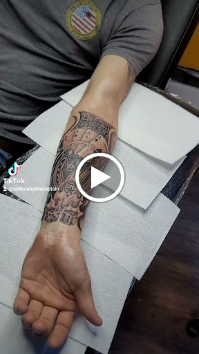 Explore mechanic sleeve tattoo ideas, creative tattoo ideas in Chattanooga, available at The Sailors Den Tattoos and Piercing & The Scurvy Pearl Music Venue