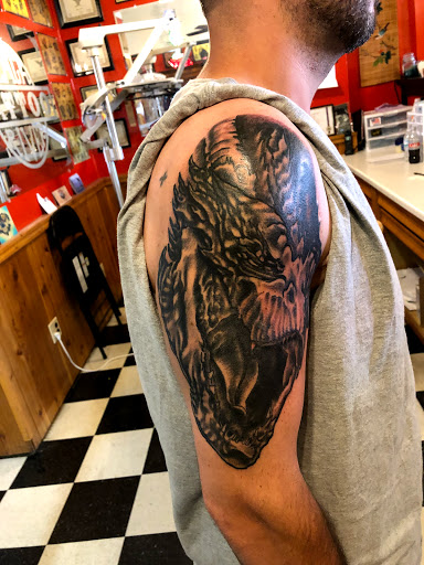 Explore familia tattoo ideas, creative tattoo ideas in Black River Falls, available at Black River Tattoo