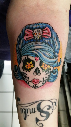 Explore chest tattoo lettering ideas, creative tattoo ideas in Erie, available at EliKingInk