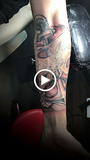 Explore back arm tattoo ideas for guys, creative tattoo ideas in Lake Charles, available at Brand-X Tattoo & Piercing