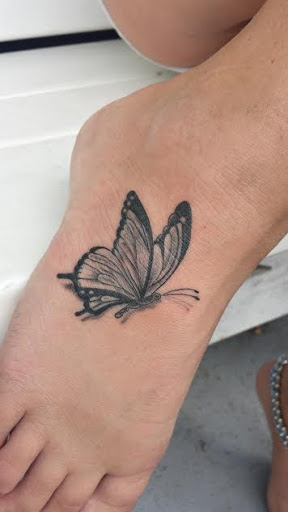 Explore survivor tattoo ideas, creative tattoo ideas in Port Aransas, available at SHARK ATTACK TATTOO