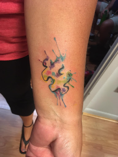 Explore barbell tattoo ideas, creative tattoo ideas in Jonesboro, available at Immortal Ink