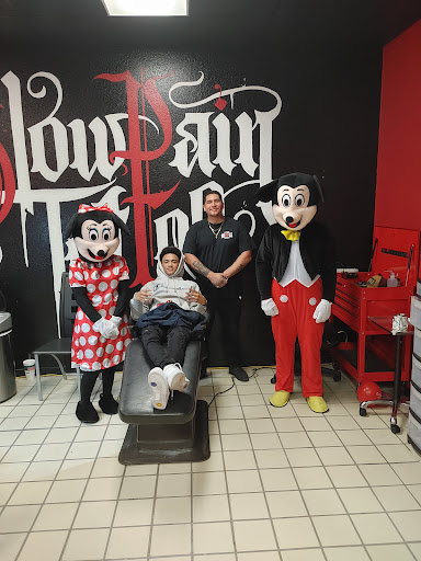 Explore sound wave tattoo ideas, creative tattoo ideas in Hereford, available at Slow Pain Tattoo Body Art Studio