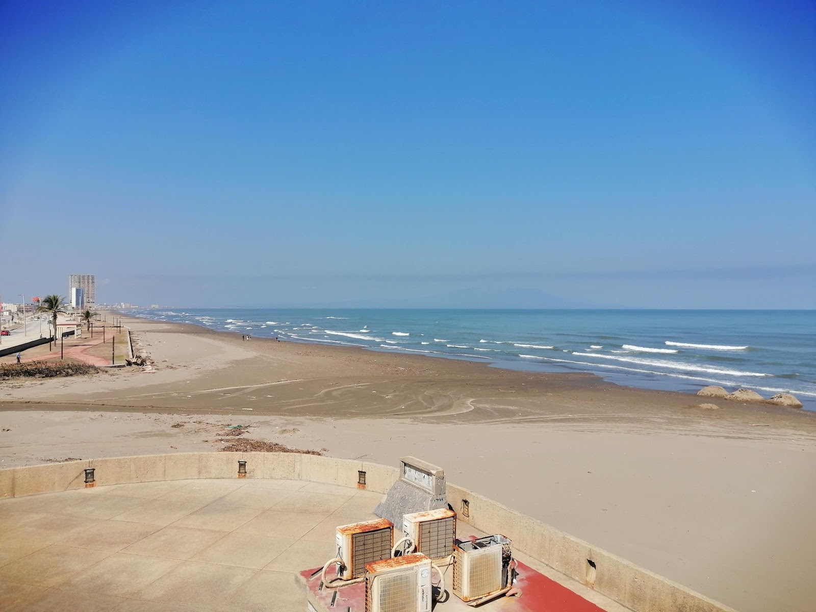 Foto de Playa Coatza con arena beige superficie