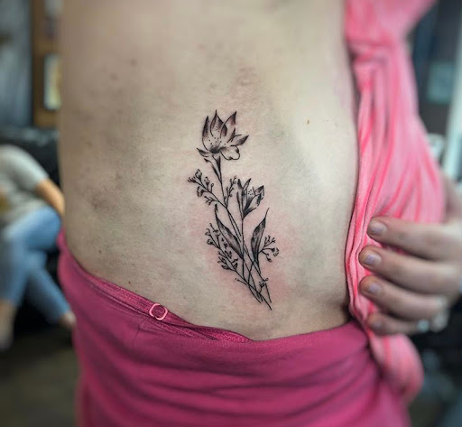 Find small tattoo between breast ideas for your next unique tattoo in Meridian at Meridian Tattoo