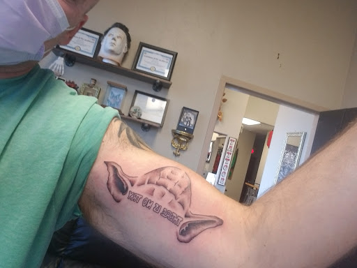 Explore newborn tattoo ideas for dad, creative tattoo ideas in Edmond, available at 15th Legion Tattoo & Body Piercing