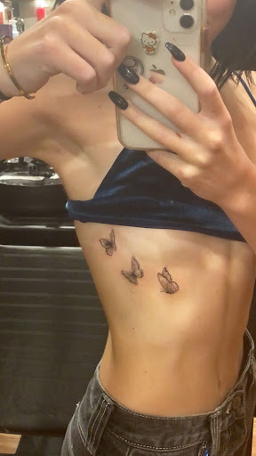 Explore small daisy tattoo ideas, creative tattoo ideas in Oceanside, available at Maritime Tattoo & Body Piercing