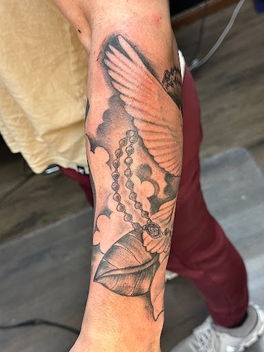 Explore handcuff tattoo ideas, creative tattoo ideas in Lake Charles, available at Brand-X Tattoo & Piercing