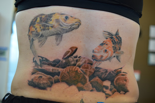 Tattoo Shop «The Shop», reviews and photos, 141 S Grand Ave, Fowlerville, MI 48836, USA