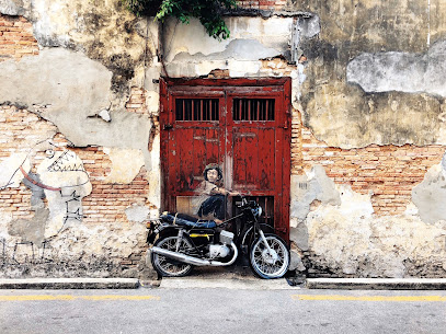Street Art by Ernest Zacharevic - 'Boy on Motorbike'