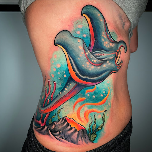 Explore wrap around wrist tattoo ideas, creative tattoo ideas in West Palm Beach, available at TBA Tattoos