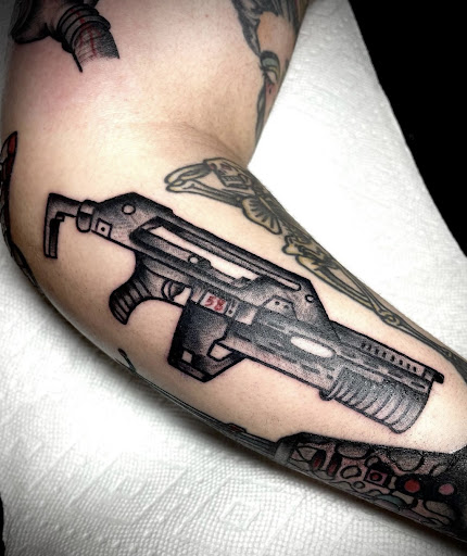 Explore semicolon tattoo ideas for men, creative tattoo ideas in Fort Lauderdale, available at Electric Street Tattoo