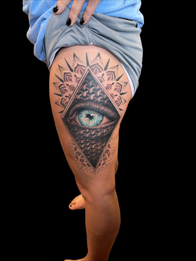 Explore cherubim tattoo ideas, creative tattoo ideas in Jasper, available at Voodoo Dolls Tattoo Studio