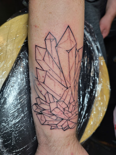 Explore eagle feather tattoo ideas, creative tattoo ideas in Roanoke, available at RailYard INK