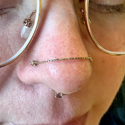 Explore men's back shoulder tattoo ideas, creative tattoo ideas in Memphis, available at Rose Quartz Body Adornment LLC