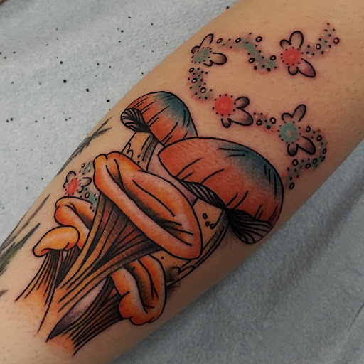 Explore women half sleeve tattoo ideas, creative tattoo ideas in Mobile, available at Old Familiar Tattoo Company