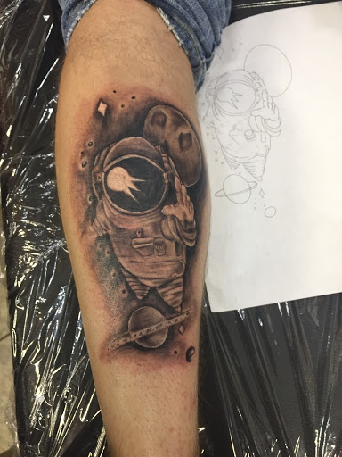 Explore tattoo ideas for back of leg, creative tattoo ideas in Warren, available at Inkoholics Tattoo