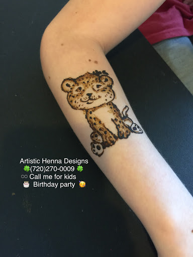 Explore grinch tattoo ideas, creative tattoo ideas in Littleton, available at Artistic Henna Designs