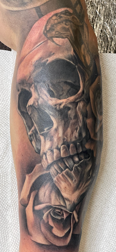 Explore forearm flower tattoo ideas, creative tattoo ideas in Stillwater, available at Anchors End Tattoo of Stillwater Minnesota