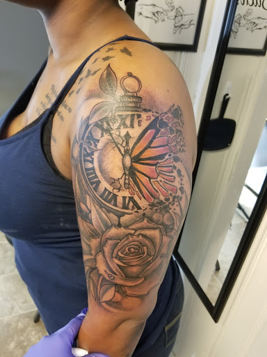 Explore christian sleeve tattoo ideas, creative tattoo ideas in Albany, available at Tat Jones Ruthless Tattoos L.L.C.