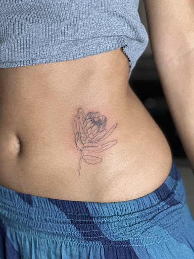 Explore marigold tattoo ideas, creative tattoo ideas in Kailua Kona, available at Mehana Tattoo