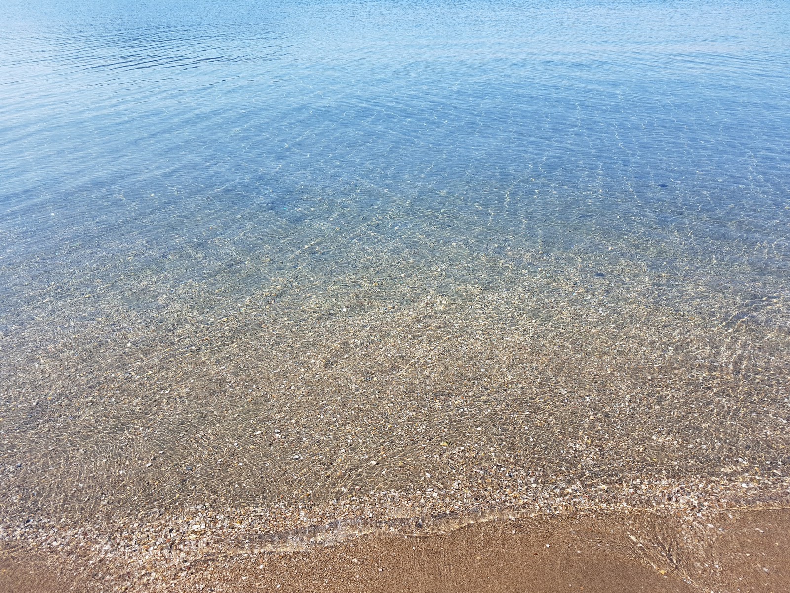 Foto de Agios Dimitrios beach - lugar popular entre os apreciadores de relaxamento