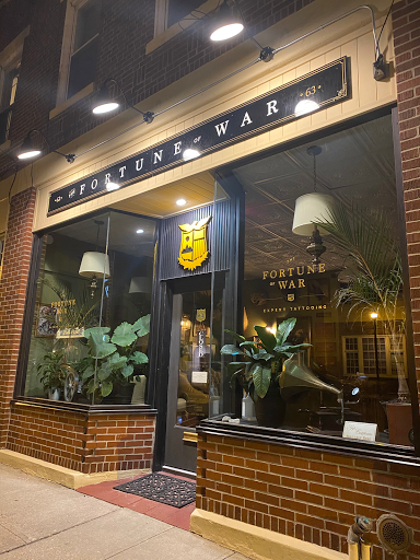 Explore half arm sleeve tattoo ideas, creative tattoo ideas in Oyster Bay, available at The Fortune of War