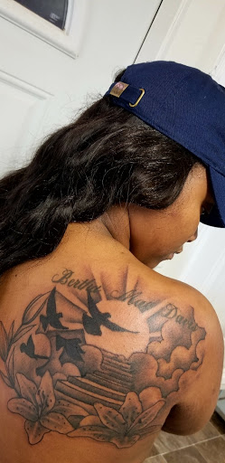 Explore breast cancer tattoos ideas, creative tattoo ideas in Albany, available at Tat Jones Ruthless Tattoos L.L.C.