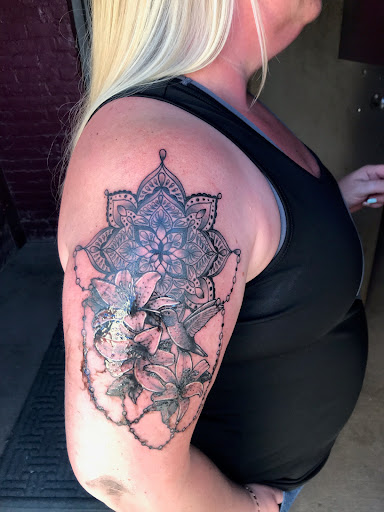 Explore climbing tattoo ideas, creative tattoo ideas in La Crosse, available at Nickel & Brass Tattoo Collective