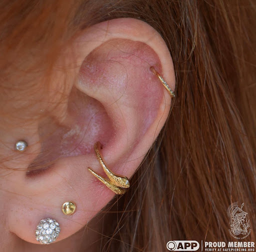 Explore leg tattoo cover up ideas for men, creative tattoo ideas in Pompano Beach, available at Athena Body Adornment