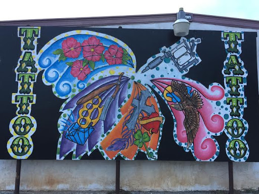 Explore rengoku tattoo ideas, creative tattoo ideas in Lawton, available at Impact Ink Tattoo Studios