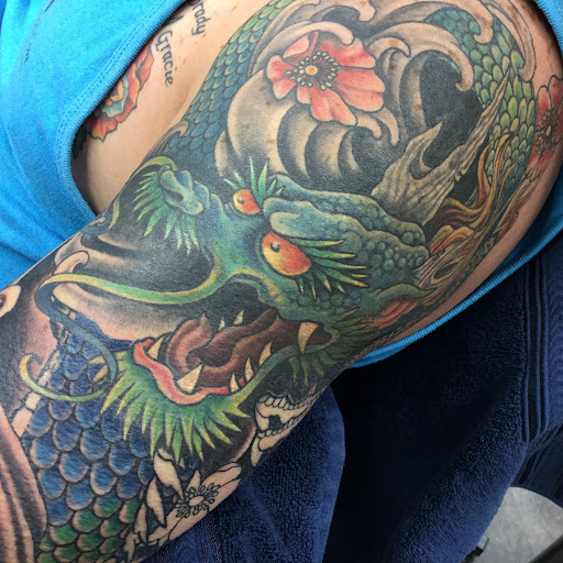 Explore niece and nephew tattoo ideas, creative tattoo ideas in Topeka, available at Looking Glass Tattoo & Gallery