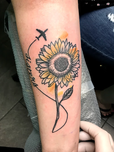Explore tattoo ideas arm, creative tattoo ideas in Kansas City, available at Golden Stag Tattoo and Gallery