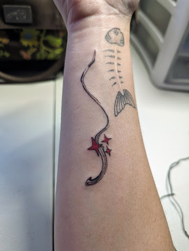 Explore silver line tattoo ideas, creative tattoo ideas in Plano, available at Vixen Body Art