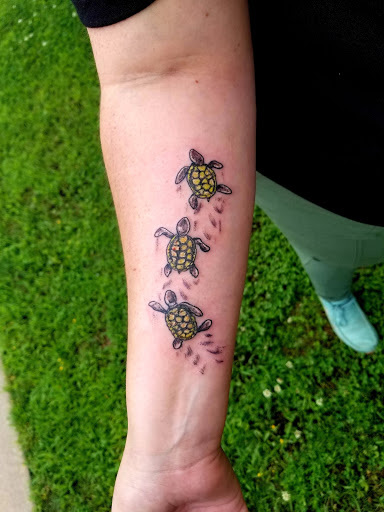 Explore mens angel tattoo ideas, creative tattoo ideas in Conway, available at Primal Urge Tattoos