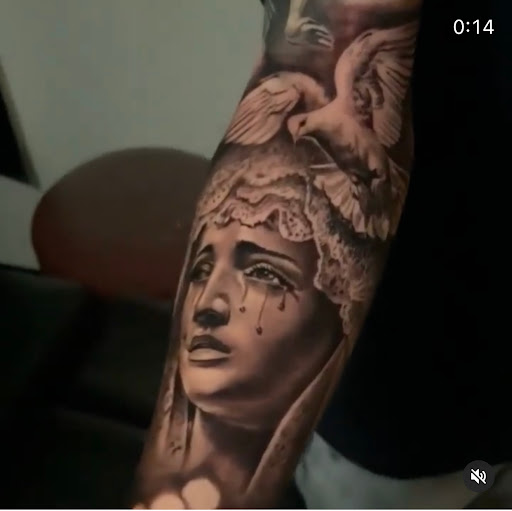 Explore neck tattoo cover up ideas, creative tattoo ideas in Fort Wayne, available at Grade A Tattoos and Body Piercing