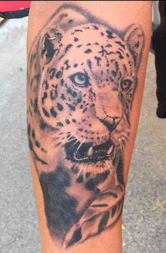 Explore moon and sun tattoo ideas, creative tattoo ideas in Yucca Valley, available at Strata Tattoo Lab LLC