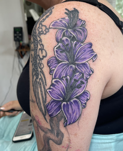 Explore dad tattoo ideas for men, creative tattoo ideas in Butler, available at Kryptic Skin Tattoo