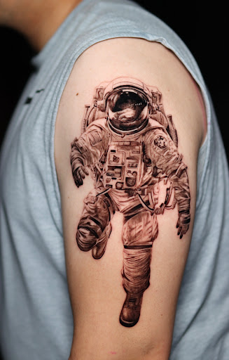 Explore ideas for arm tattoos, creative tattoo ideas in Houston, available at Black Swan Tattoo Studio